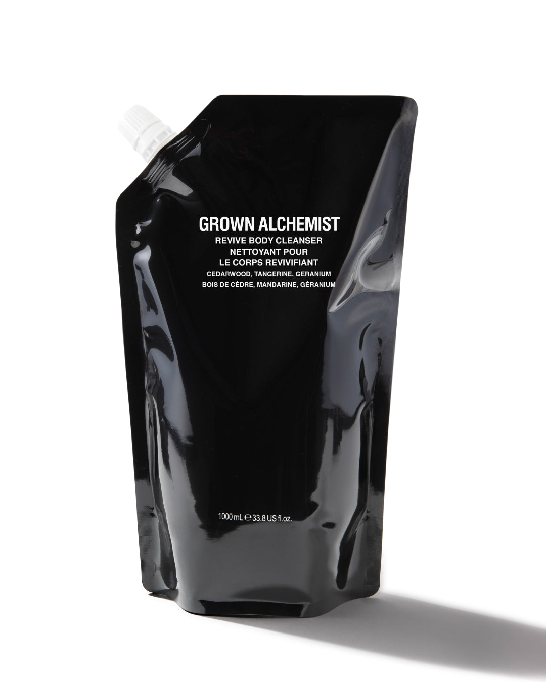 Black pouch with 'Grown Alchemist' branding on a white background