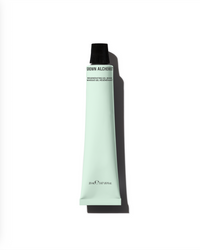 Tube of Grown Alchemist product on a white background