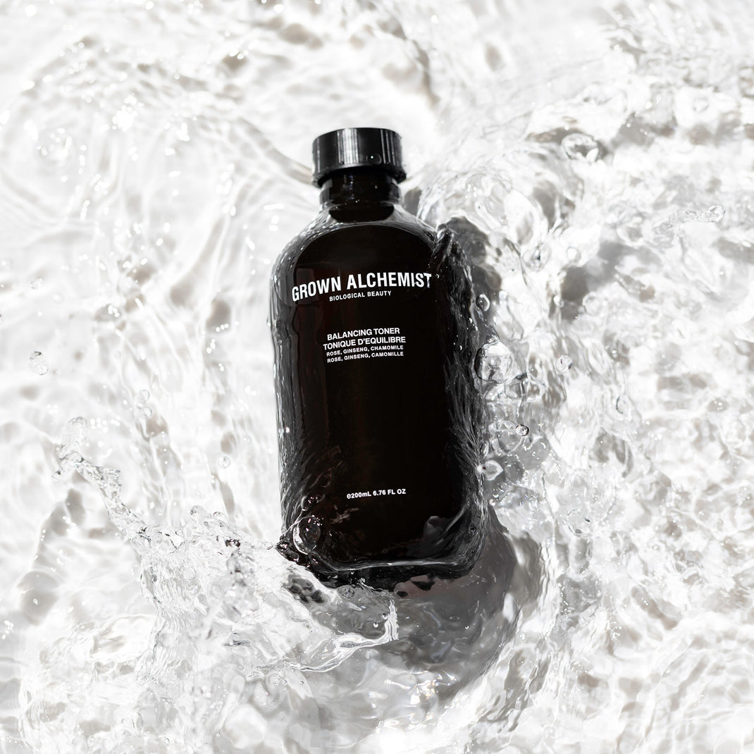 Grown Alchemist bottle in water