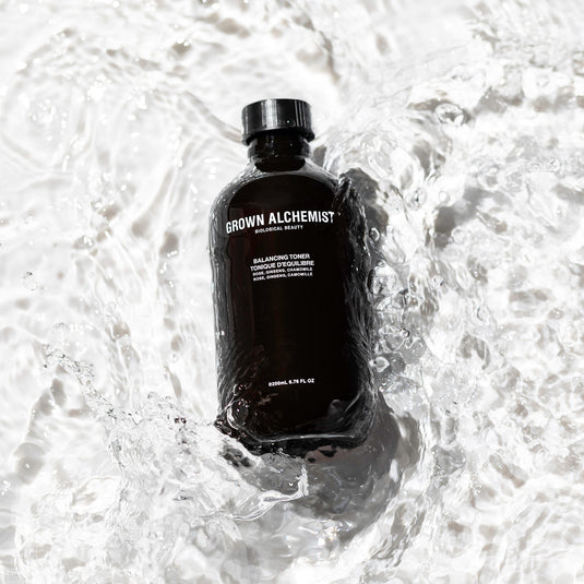 Grown Alchemist bottle in water