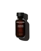 Brown bottle with black cap on a white background, featuring 'Grown Alchemist' branding.