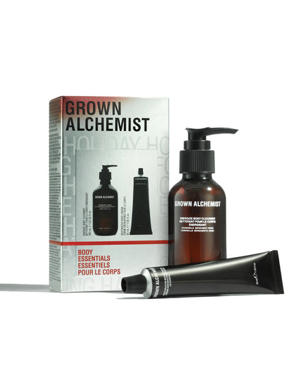 Grown Alchemist body care products including a bottle, tube, and packaging on a white background