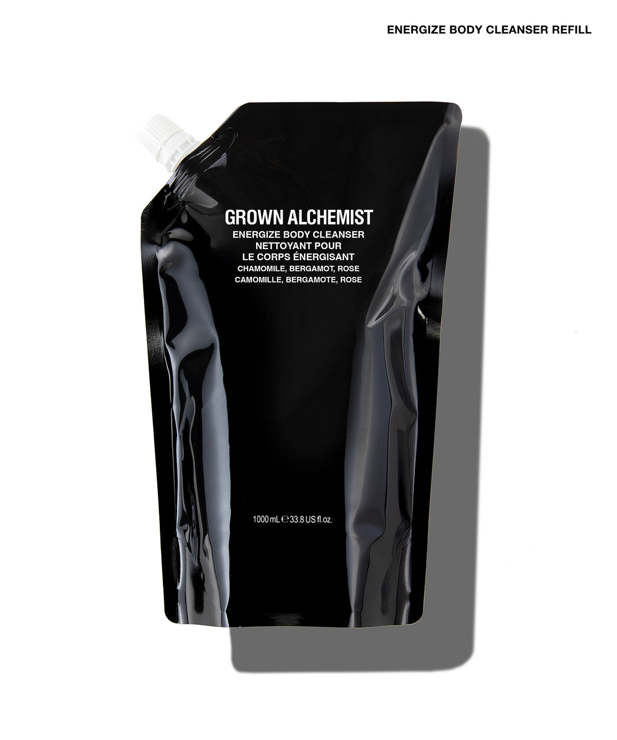 A black refill pouch of Grown Alchemist Energize Body Cleanser on a white background with a soft shadow.