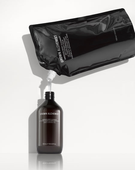 Bottle and refill packaging of Grown Alchemist on a white background