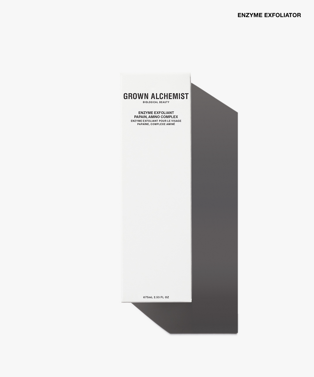 A tall, narrow white product box for Grown Alchemist Enzyme Exfoliator, shown on a clean white background with a soft gray shadow. The box features black text detailing the exfoliating facial peel.