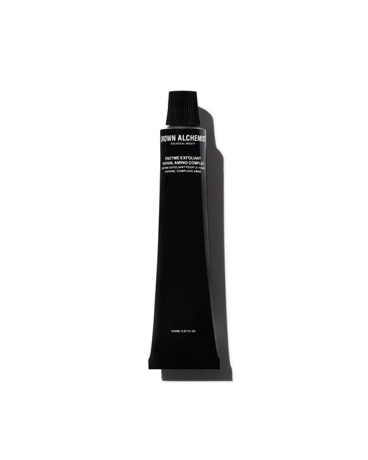 Black cosmetic tube with brand name on a white background