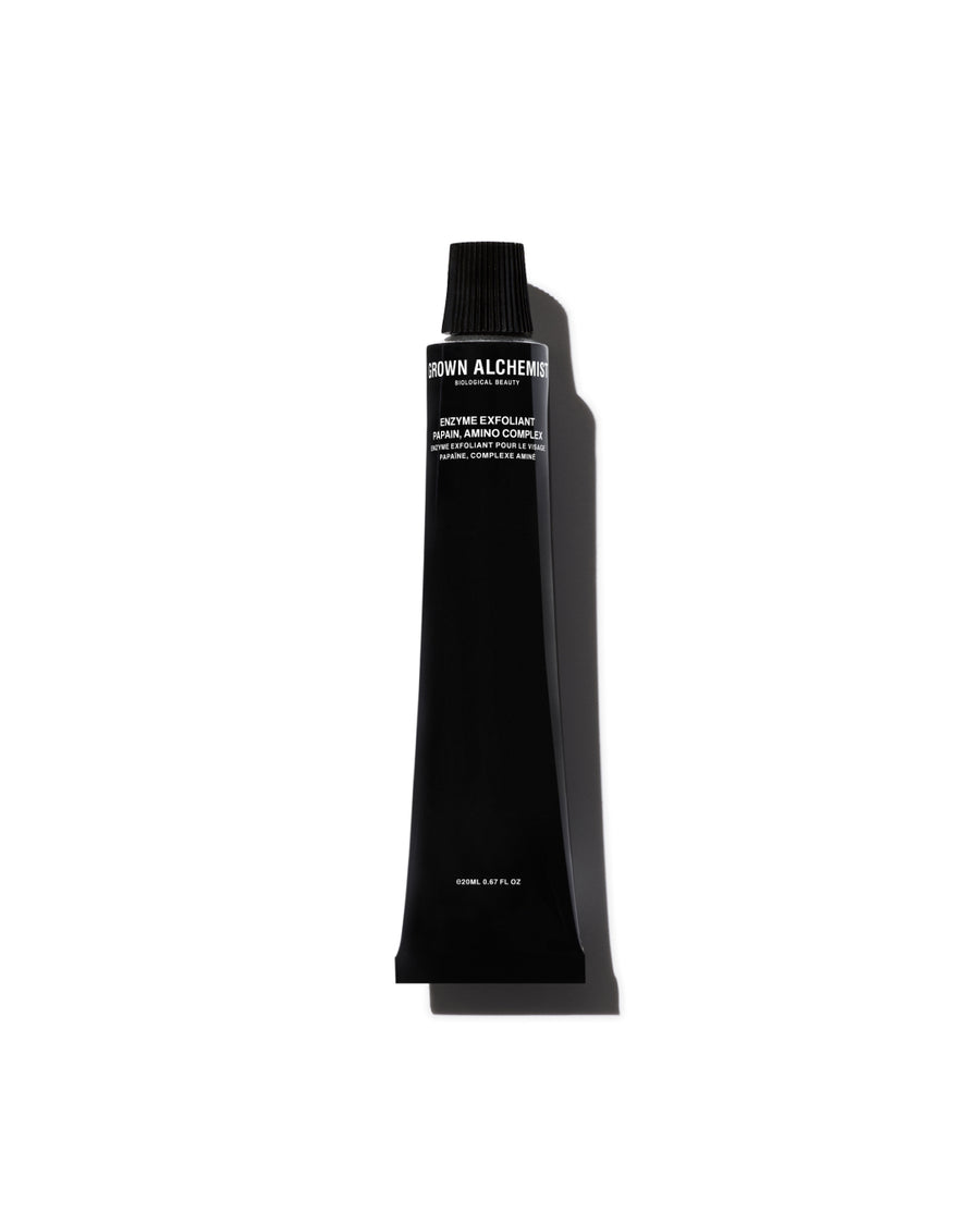 Black cosmetic tube of Grown Alchemist  Enzyme Exfoliant on white background.