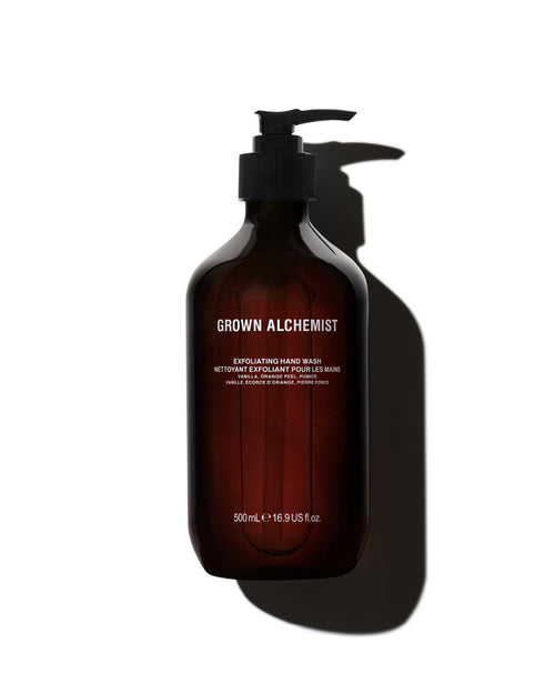 Brown bottle with pump labeled 'Grown Alchemist' on a white background