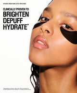 Close-up beauty ad showing a woman's face with black eye patches applied under her eyes, alongside large text reading 'CLINICALLY PROVEN TO BRIGHTEN DEPUFF HYDRATE'.
