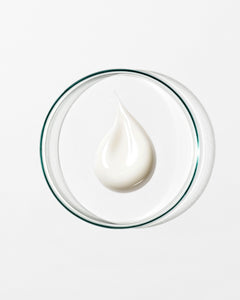swatch of hand cream on white background.