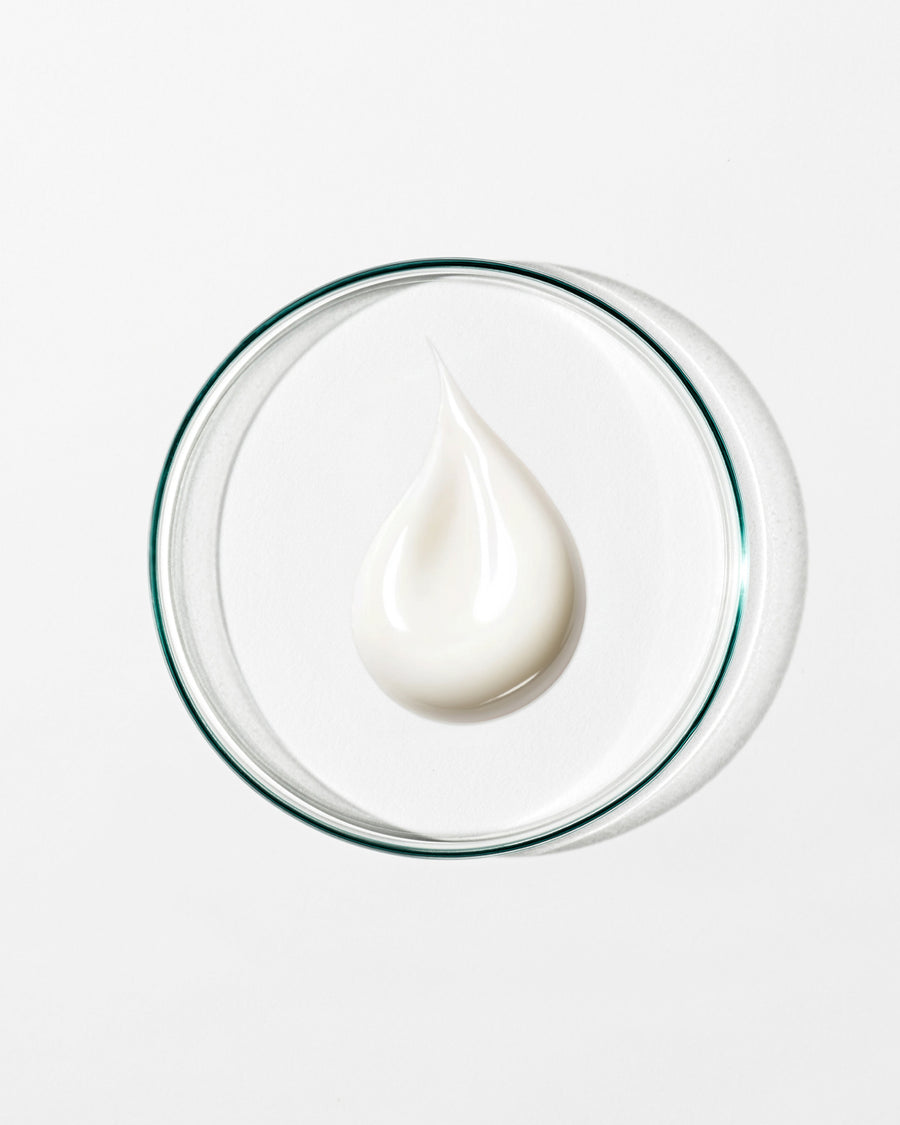 swatch of hand cream on white background.