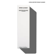 A tall, slim white rectangular box for Grown Alchemist Hydra-Restore Cream Cleanser, shown on a white background with a soft gray shadow to the right.