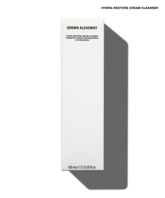 A tall, slim white rectangular box for Grown Alchemist Hydra-Restore Cream Cleanser, shown on a white background with a soft gray shadow to the right.