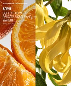 A split visual for Hydra-Restore Cream Cleanser scent 'Soft Citrus'. The left half shows close-up orange slices with text reading 'SCENT SOFT CITRUS WITH DELICATE FLORALS AND WARMTH.
