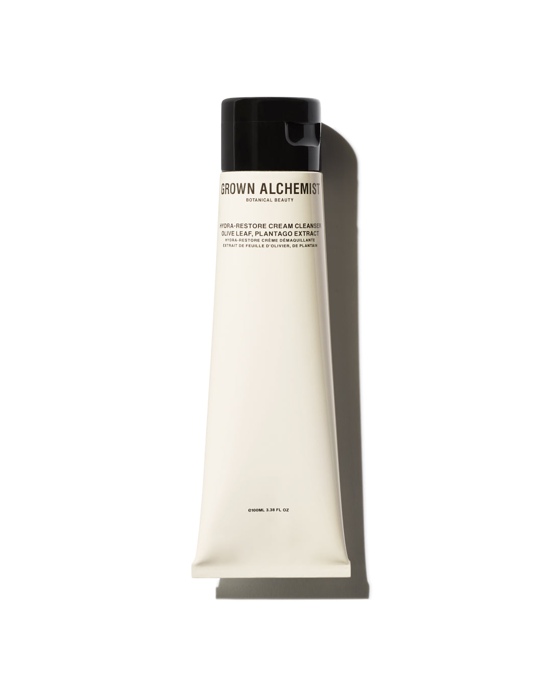 Tube of Grown Alchemist product on a white background