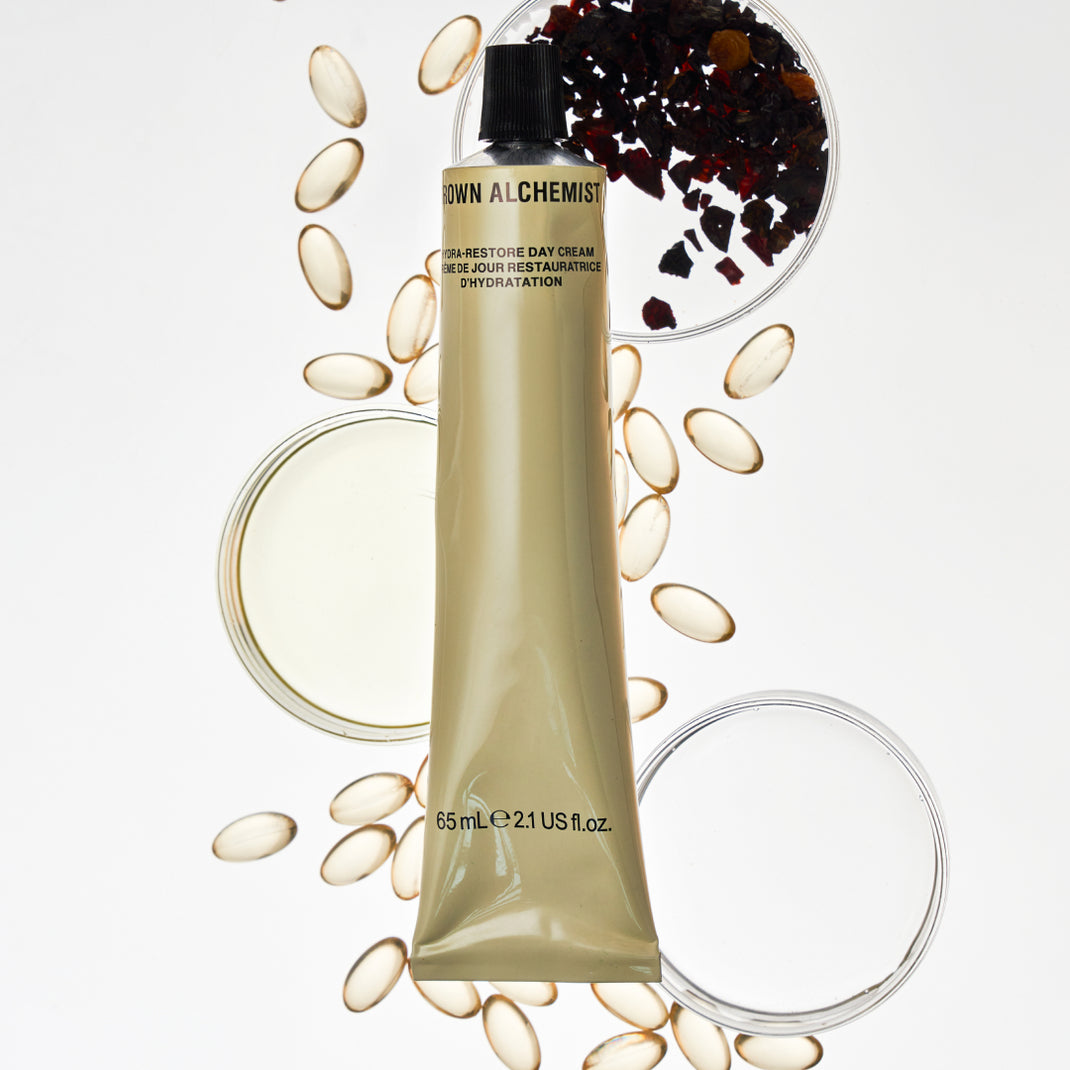 Skincare product with ingredients on a white background