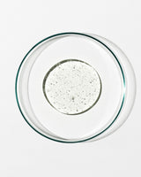 Clear glass plate with a circular pattern on a white background