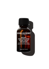 A bottle of Grown Alchemist Instant Smoothing Serum with a dark label and a clear, amber liquid visible inside.