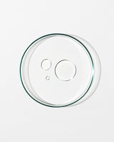 Clear glass pie dish lid on a white background