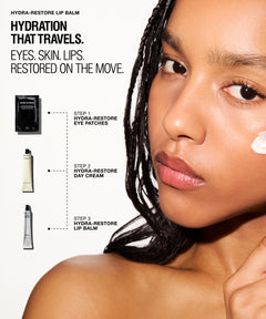 Close-up beauty ad showing a woman with hydrated skin and lips, alongside product callouts for Hydra-Restore lip balm, eye patches, and day cream on a white background with promotional text.