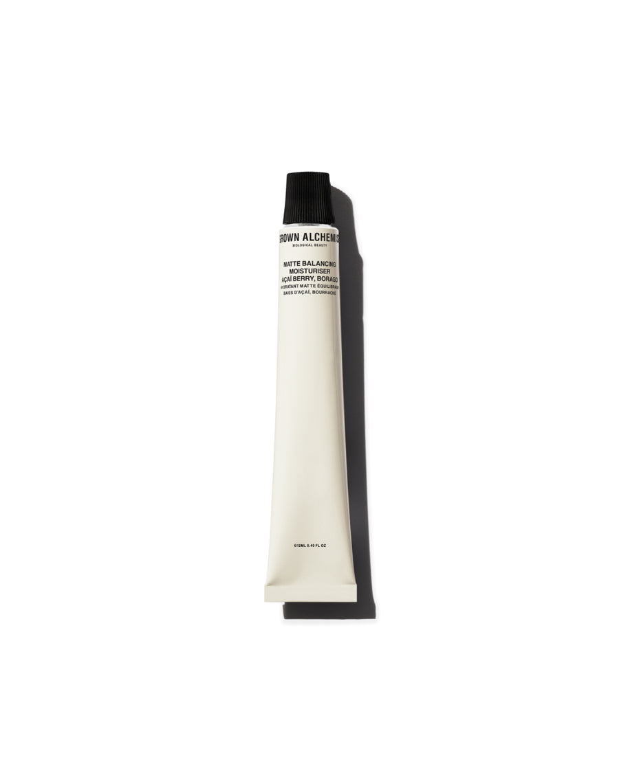 Tube of Grown Alchemist lotion on a white background