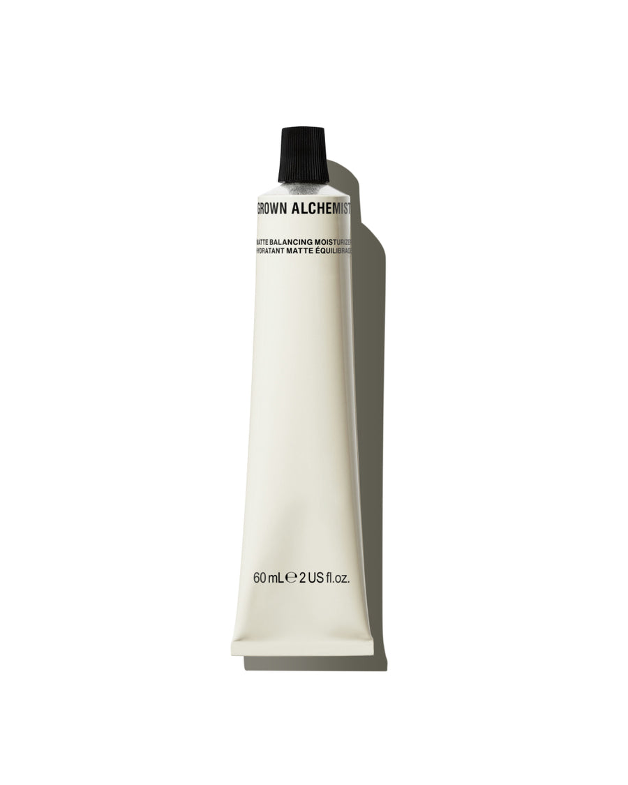 Tube of Grown Alchemist cream on a white background