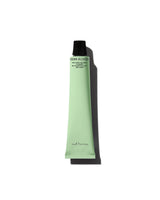 Meltaway gel milk cleanser tube on white background.