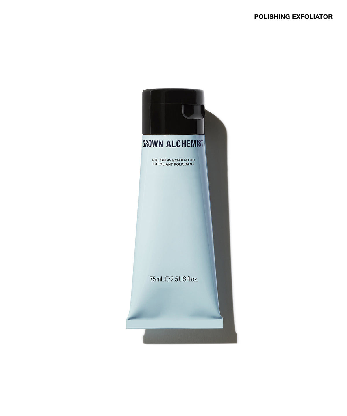 A squeeze tube of Grown Alchemist Polishing Exfoliator on a clean white background with a soft shadow. The tube is a very pale icy blue with a black cap, and the brand name 'GROWN ALCHEMIST' is printed in black on the front.