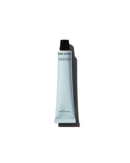 Polishing exfoliator tube on white background.