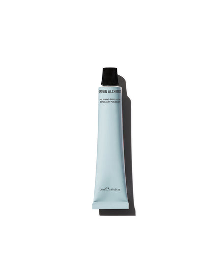 Skincare tube with black cap on a white background
