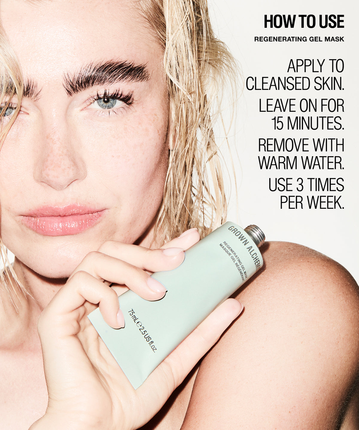 A close-up beauty ad showing a woman holding a pale mint-green tube labelled GROWN ALCHEMIST Regenerating Gel Mask, with text on the right explaining how to use it.