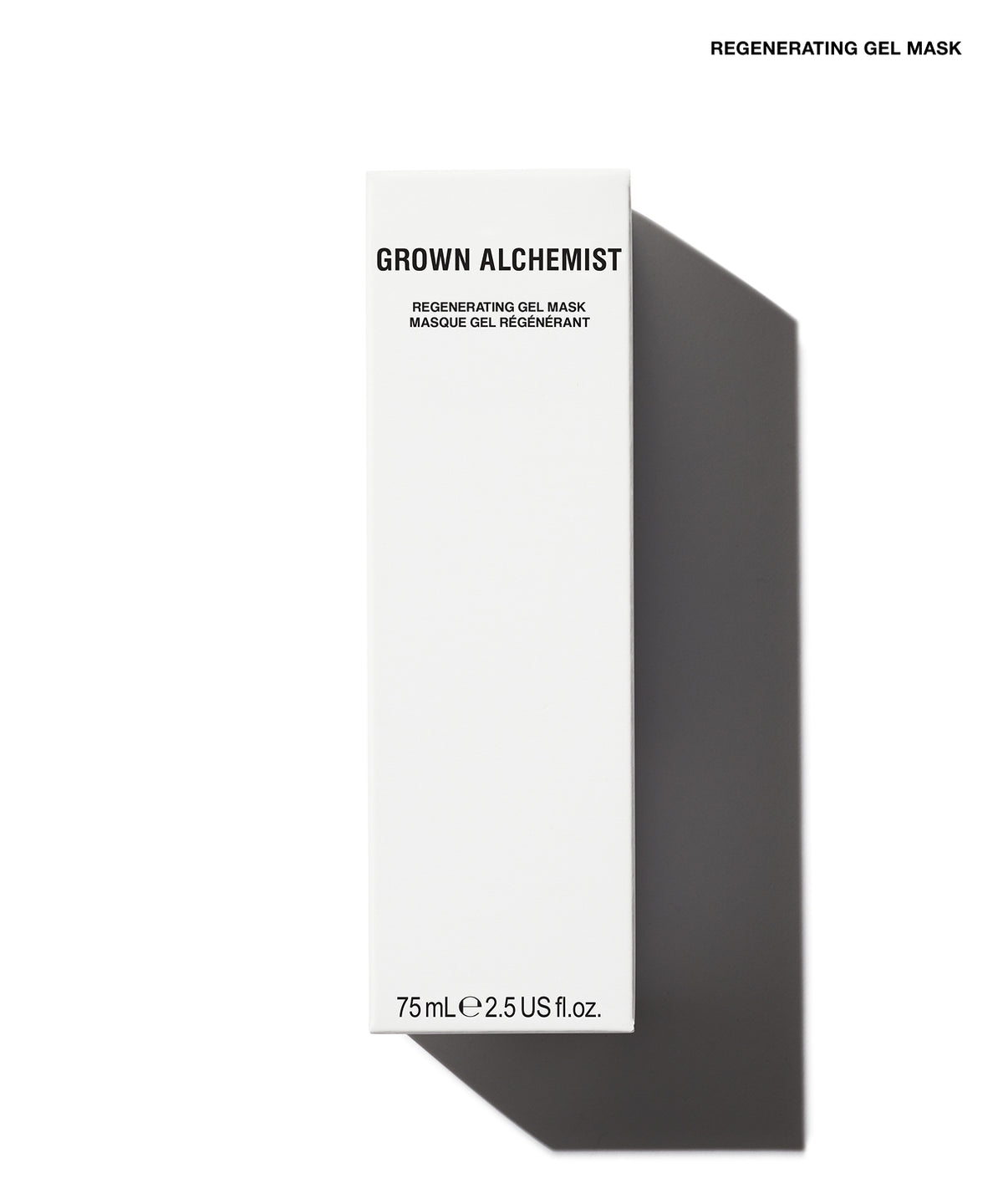A tall, slim white rectangular box for Grown Alchemist Regenerating Gel Mask, shown on a white background with a strong cast shadow to the right. The box features black text and is photographed from a high angle.