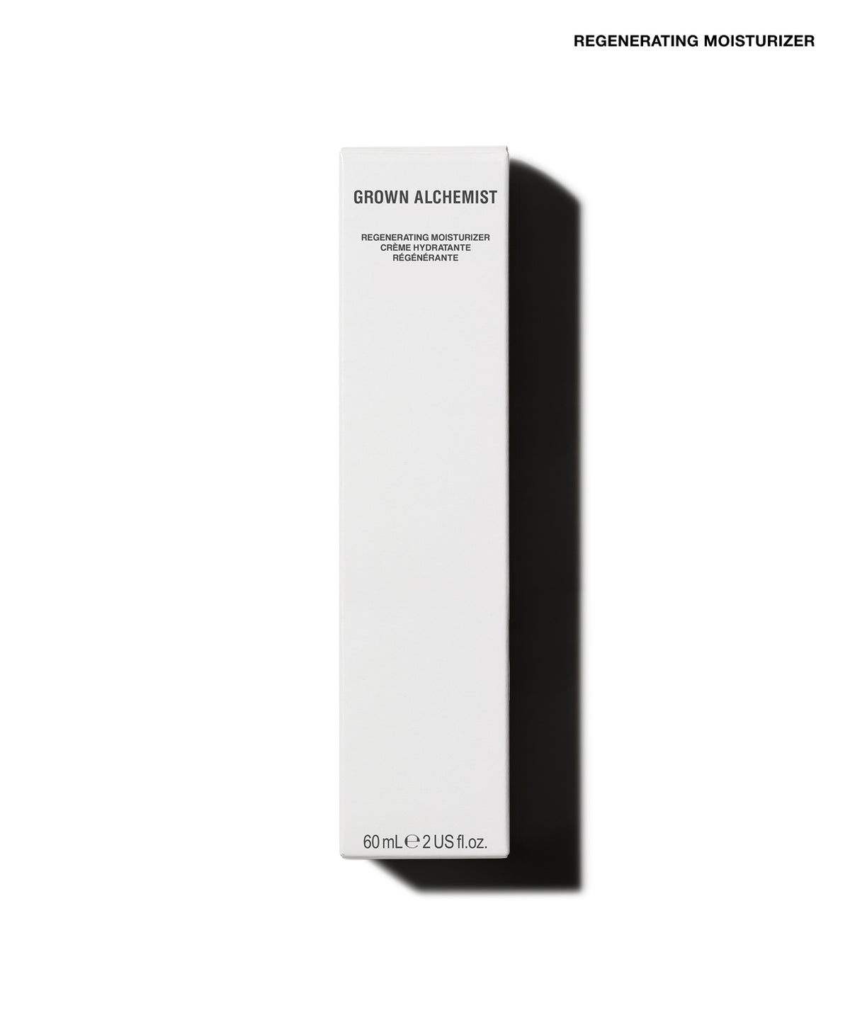 A tall, narrow white rectangular box for Grown Alchemist Regenerating Moisturizer, shown on a clean white background with a strong black shadow to the right. Small black text at the top right reads 'REGENERATING MOISTURIZER'.