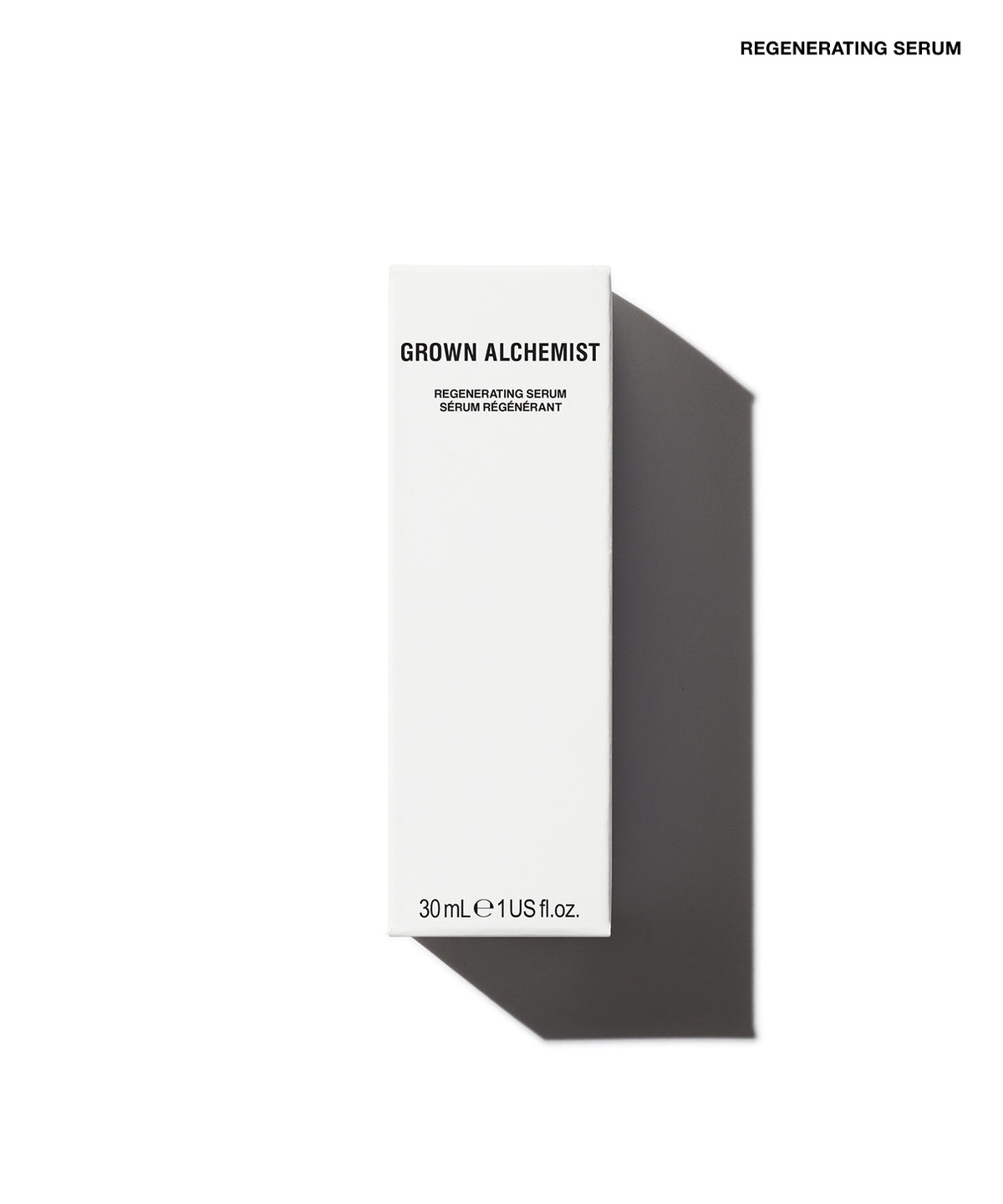 A tall, slim white skincare bottle labeled 'GROWN ALCHEMIST REGENERATING SERUM' on a clean white background with a soft shadow cast to the right.