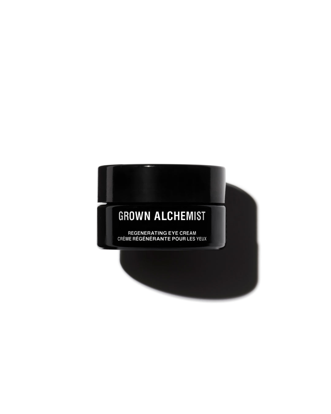 Black eye cream jar with 'Grown Alchemist' branding on a white background