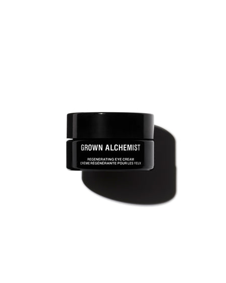 Black eye cream jar with 'Grown Alchemist' branding on a white background