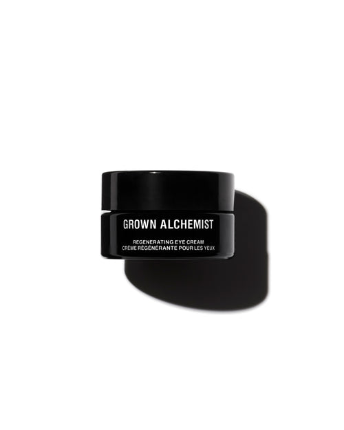 Black eye cream jar with 'Grown Alchemist' branding on a white background
