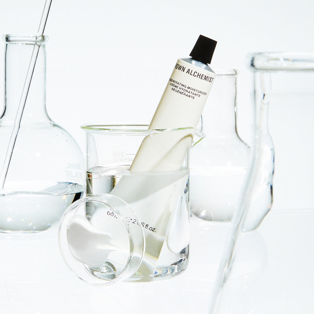 Skincare bottle in a glass with clear background