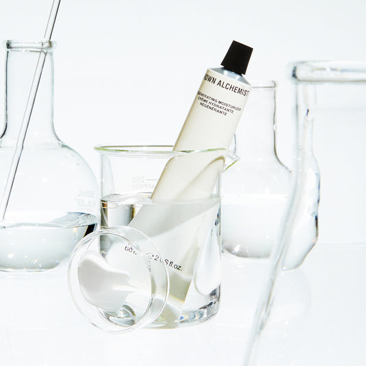 Skincare bottle in a glass with clear background