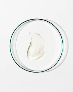 Swatch of moisturiser on white background.