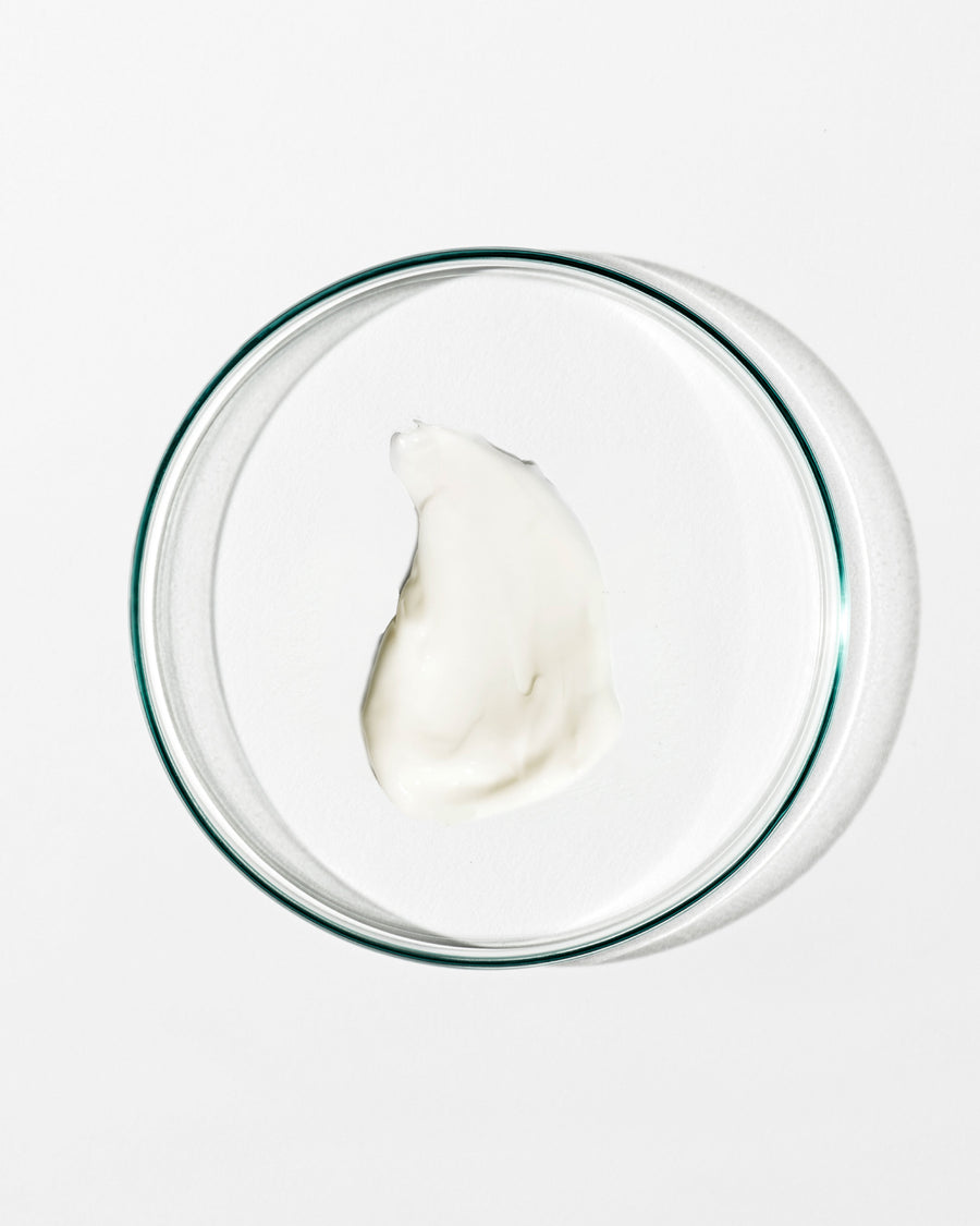 Swatch of moisturiser on white background.