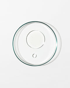 Clear glass lid on a white background