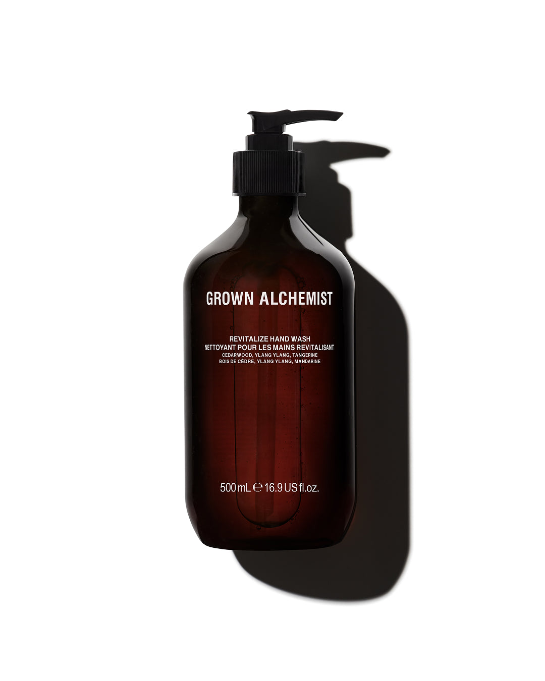 Brown bottle with pump labeled 'Grown Alchemist' on a white background