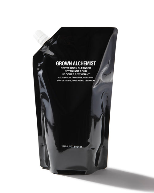 Black pouch with 'Grown Alchemist' branding on a white background