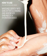 Close-up of a hand receiving a thick white cream being poured from above, with overlaid text reading 'HOW TO USE RESTORATIVE HAND CREAM' and additional usage instructions.