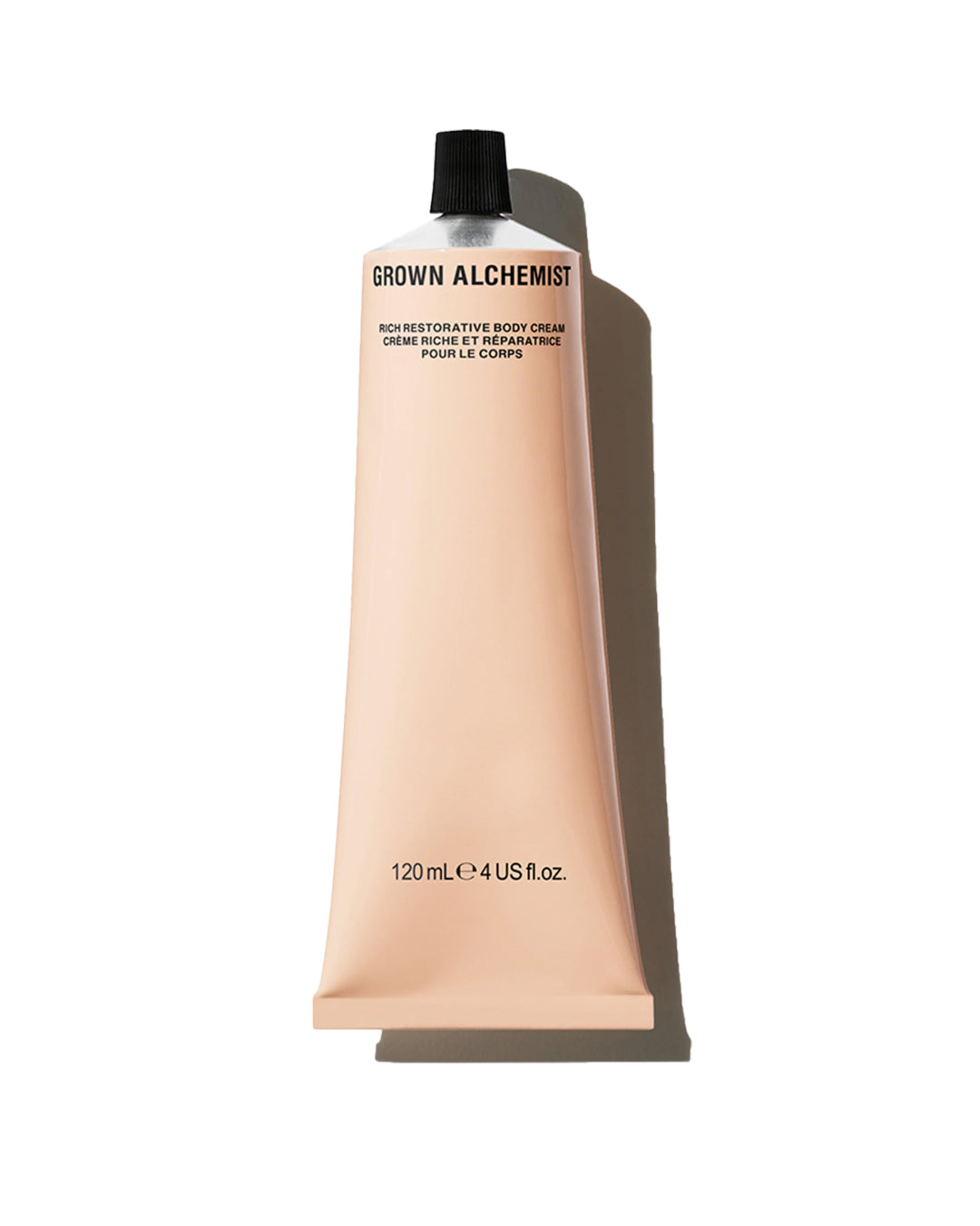 Grown Alchemist body cream tube on a white background