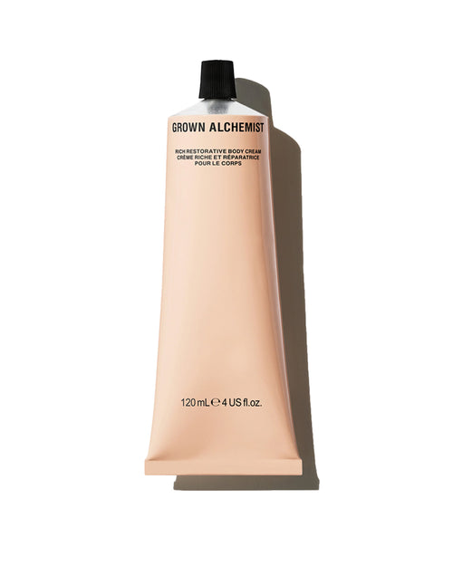 Grown Alchemist body cream tube on a white background