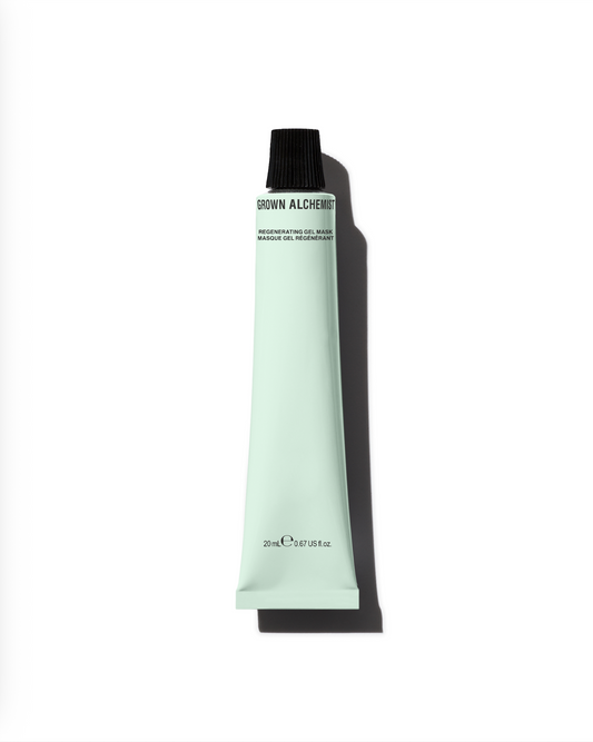 Tube of Grown Alchemist product on a white background