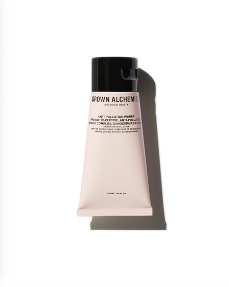 Tube of Grown Alchemist skincare product on a white background