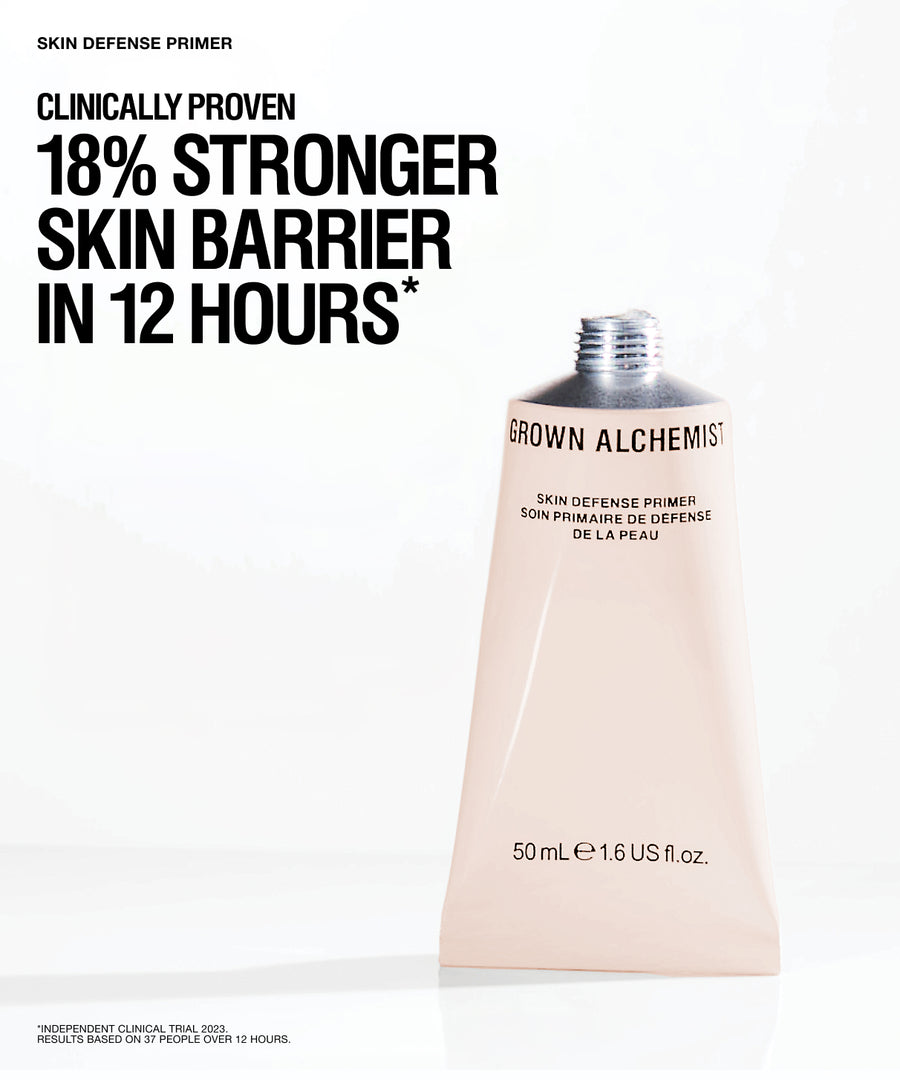 A squeeze tube of Grown Alchemist Skin Defense Primer on a clean white background, with large black marketing text on the left reading 'Clinically Proven 18% Stronger Skin Barrier in 12 Hours*'.